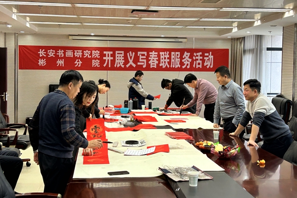 1737516917768498.jpg 书法先生誊写春联_副本.jpg